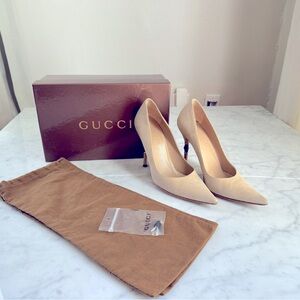 Gucci Suede Heels with Bamboo heel accent.